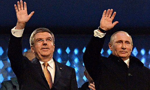 IOC-Präsident Thomas Bach und Russlands Präsident Wladimir Putin, Erföffnungsfeier der Olympischen Winterspiele in Sotschi (Credit: Alberto Pizzoli/AFP/Getty Images)